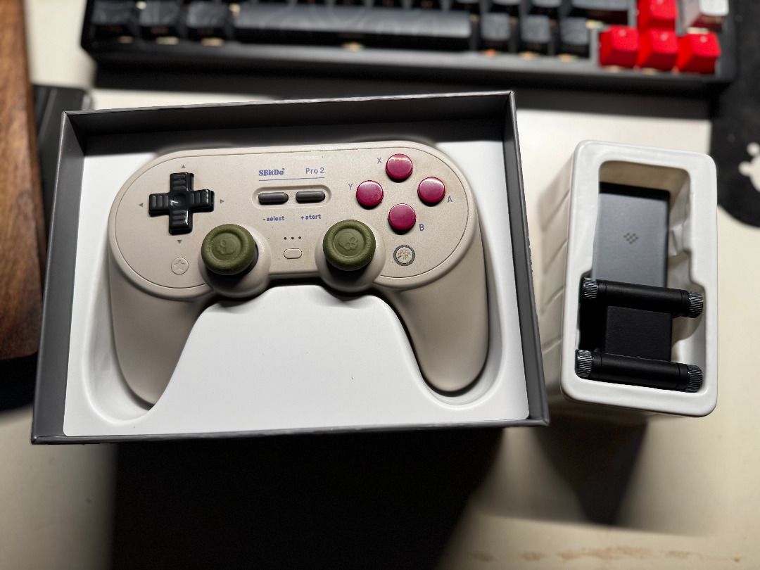 8BitDo Pro 2 Bluetooth Controller with Phone Clip (Category: Controllers) located in Marilao. Submitted by miguelsanti (Listing ID 1467667706, Image 3). Description: - 8BitDo Pro 2 Bluetooth Gamepad - Accessories included: Original box packaging and type c cable - Green thumbstick grips and phone clip included - Condition/Inclusions: Everything pictured is included, well-maintained and ready to use Bought originally for ₱2,000 No longer being use