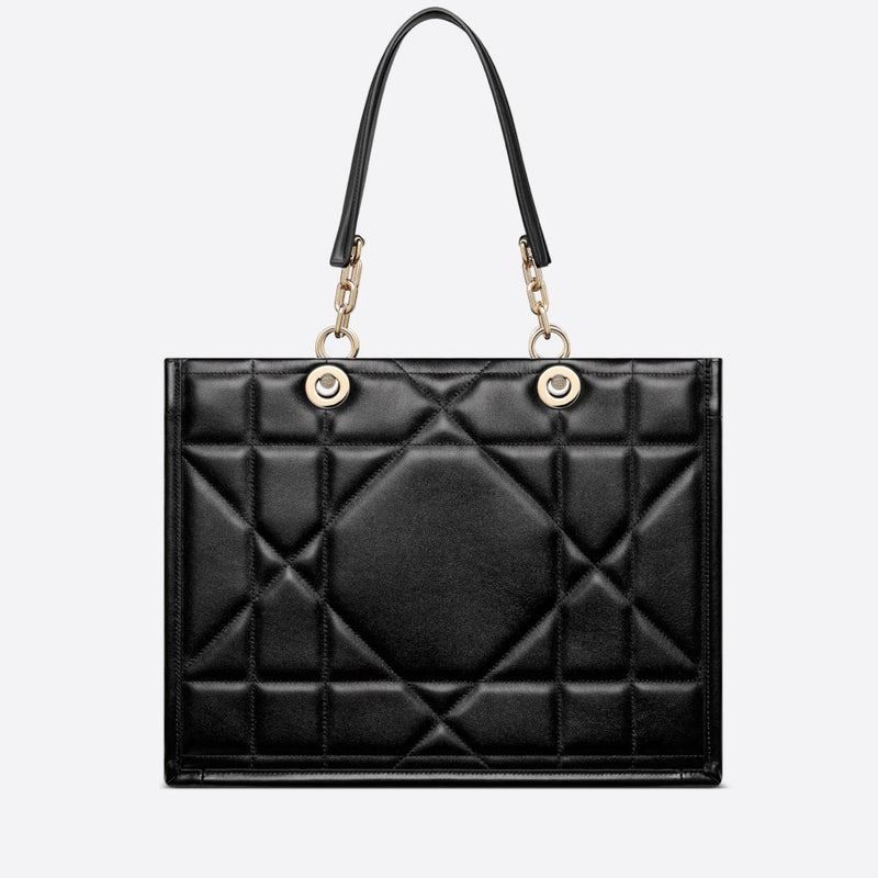 💢 Christian Dior Medium Essential Tote Bag (Category: Luxury Bags & Wallets) located in Kibawe. Submitted by yumicaspia39544 (Listing ID 1467637572, Image 1). Description: Christian Dior Medium Essential Tote Bag 13,999 plus sf Genuine soft leather Like new/ Brandnew This is CHRISTIAN DIOR Calfskin Archicannage Medium Essential Tote in Black. This bag is crafted of quilted black calfskin leather and gold hardware. The top opens to a black suede 