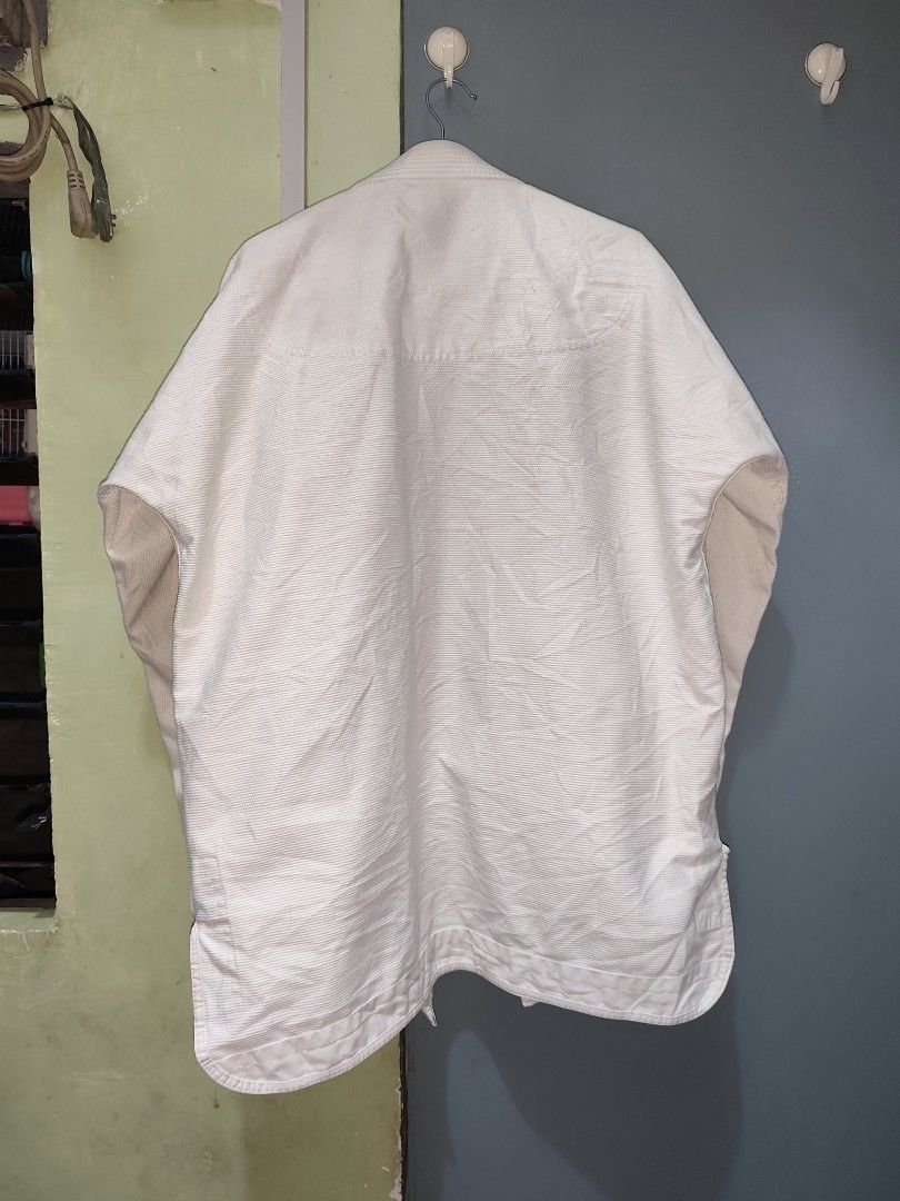 A2 - GUERILLA WHITE BJJ GI PANTS ONLY (Category: Combat Sports) located in Taguig. Submitted by mmthriftshop.ph (Listing ID 1466827012, Image 3). Description: 🥋 A2L - BRUXAO x GUERILLA WHITE BJJ GI SET 💵 1,900.00 + SF ❌ NO COD/COP. ✅ Payment first policy. 🏷️ Top - no issue, just needs wash a only. Pants - May stitches pero all goods yung pagkakatahi dahil barely visible and still in great shape pa rin. 📦 Shipping via Lalamove or J&T Express. 