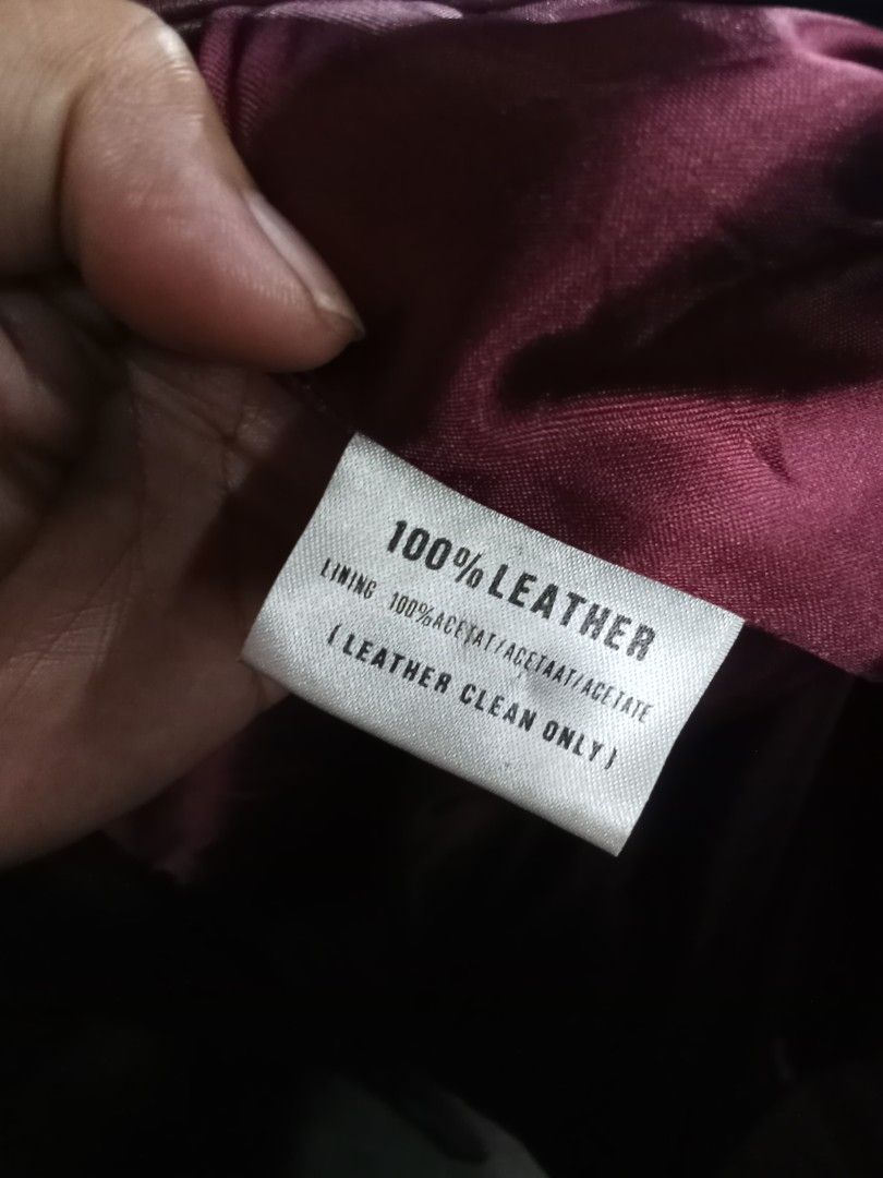 A Style Maroon 100% Leather Jacket (Category: Coats, Jackets and Outerwear) located in Caloocan City. Submitted by noy5o1a (Listing ID 1467826893, Image 3). Description: - Brand: A Style - Color: Burgundy - Size: Medium - Material: 100% genuine leather outer with acetate lining - Design: Classic collar, button-up front, structured fit - Care: Professional leather clean only - Condition/Note: Great staple piece for cooler weather.