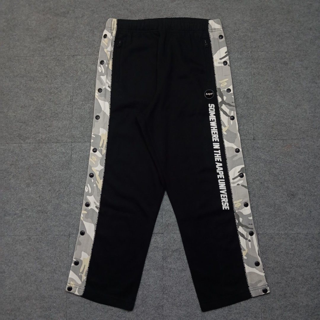 AAPE by A Bathing Ape Side Tape Logo Sweatpants (Category: Jeans) located in Taguig. Submitted by sito. (Listing ID 1467671755, Image 2). Description: For sale! 📣 AAPE by A Bathing Ape Side Tape Logo Sweatpants Specs and measurements: • Size XXS • Length 35 inches • Hips 21 inches • Thigh 14 inches • Inseam 27 inches • Leg Opening 9 Condition Details: • Excellent Condition • Issue: NONE • Color rate: 10/10 • Overall Condition: 10/10 Price: ~ ₱1,
