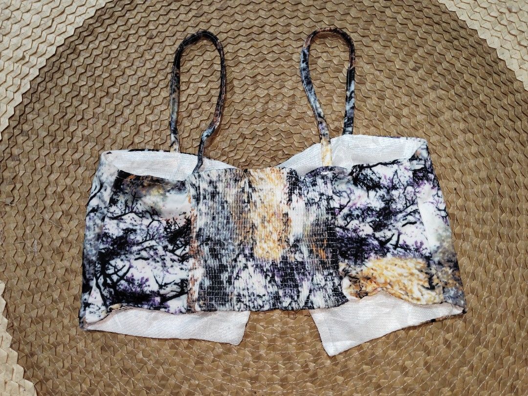 Abstract tree print cami crop top with twist front (Category: Sleeveless) located in San Juan City. Submitted by rhennx (Listing ID 1467798792, Image 2). Description: ✨59 pesos 📌XS-S Note: not padded.