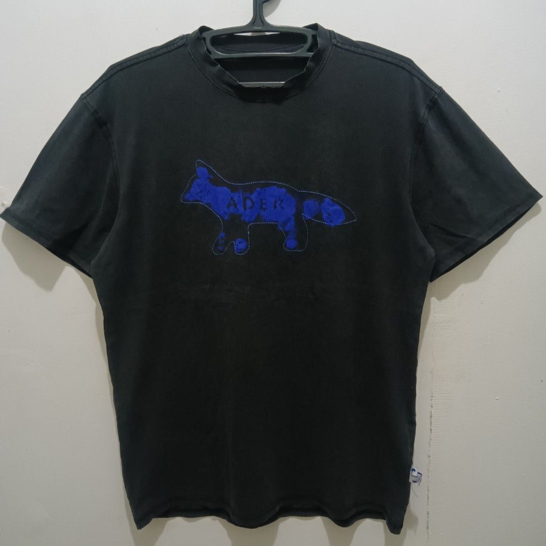 ADER MAISON KITSUNE Collab Shirt (Category: Shirts) located in Caloocan City. Submitted by jaychingsss (Listing ID 1467751387, Image 1). Description: Ader x Maison Kitsune Shirt - 80 20x27 Color Rate: 8.5/10 Issue: Bacon neckline NEED WASH.