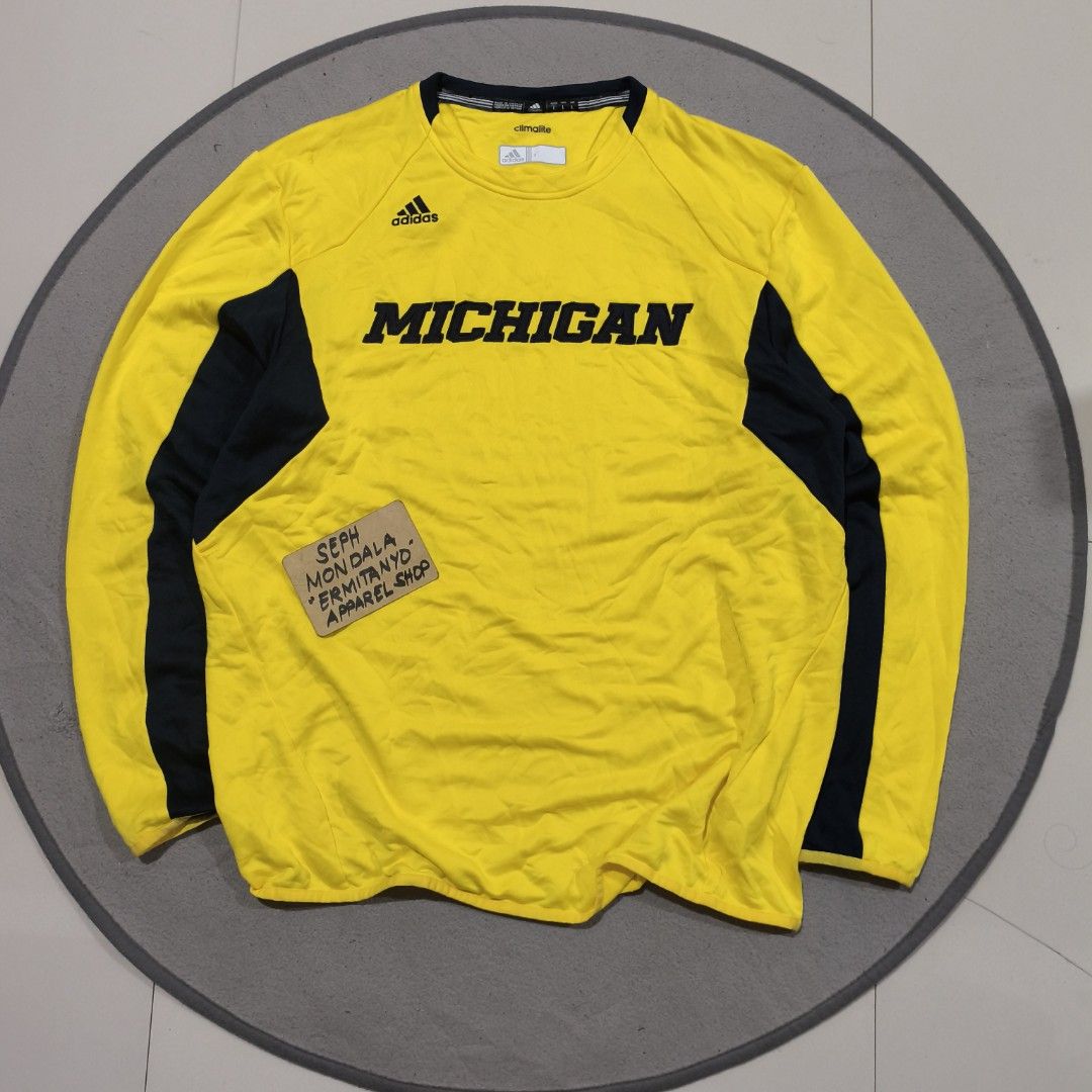 Adidas 2013 Michigan wolverines (Category: Activewear) located in Calatrava. Submitted by ermitany0 (Listing ID 1467758790, Image 1). Description: adidas Michigan wolverines very good condition size: Large width x length: 24"x30" flaws: light dot stains on sleeve check photos for more details ✅ location: Negros Occidental PM if interested 📩📩📩📩.