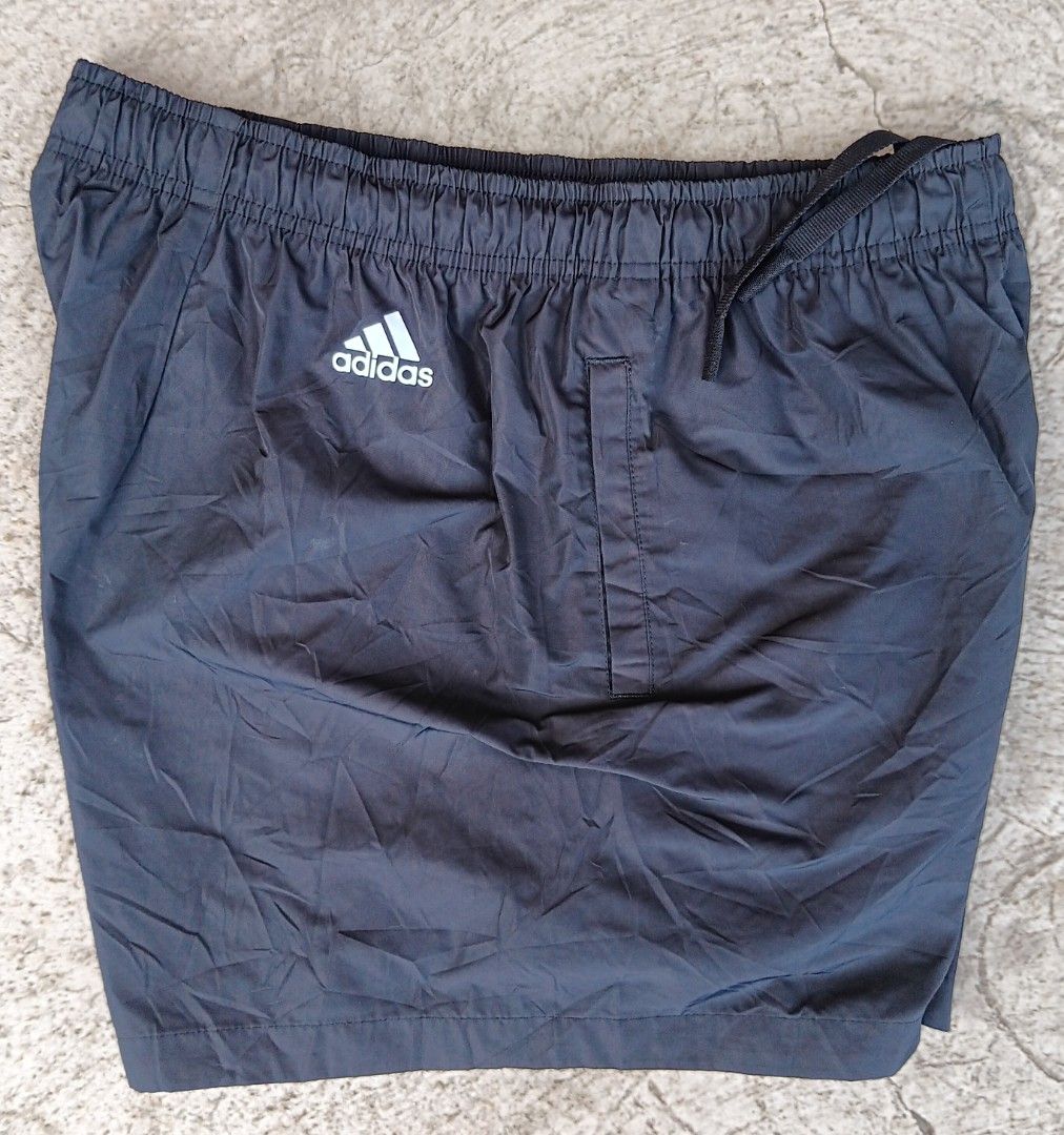 Adidas Black Shorts Size L (Category: Shorts) located in Cagayan de Oro. Submitted by kokirts17 (Listing ID 1467646892, Image 3). Description: - Brand: Adidas - Color: Classic Black - Size: A/L (170/76A) - Measurements: 15" waist across (laid flat), 15" total length - Material: Lightweight and breathable fabric - Features: Elastic waistband with adjustable drawstring, two convenient side pockets - Design: Large Adidas logo printed on the lower le
