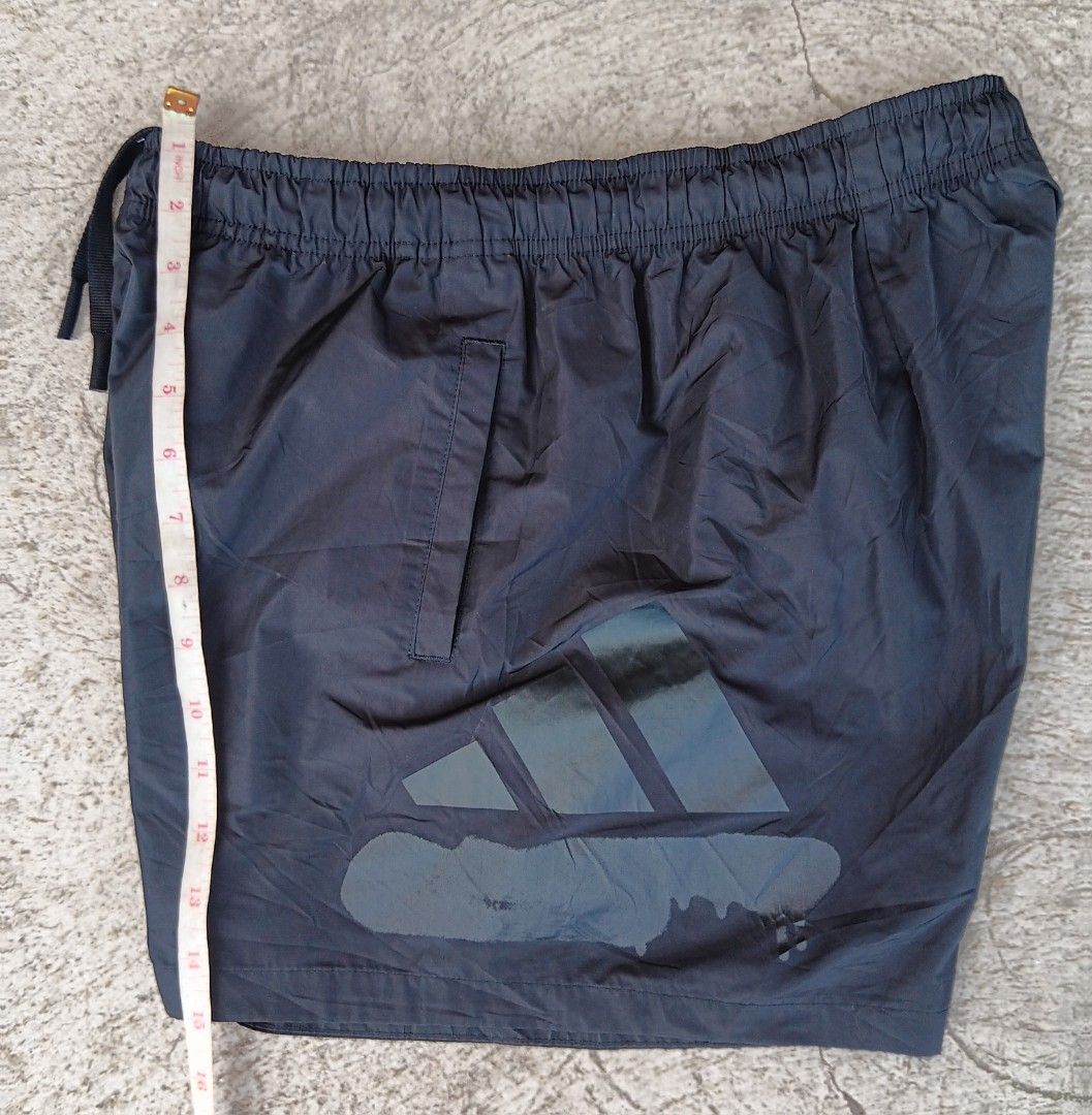 Adidas Black Shorts Size L (Category: Shorts) located in Cagayan de Oro. Submitted by kokirts17 (Listing ID 1467646892, Image 1). Description: - Brand: Adidas - Color: Classic Black - Size: A/L (170/76A) - Measurements: 15" waist across (laid flat), 15" total length - Material: Lightweight and breathable fabric - Features: Elastic waistband with adjustable drawstring, two convenient side pockets - Design: Large Adidas logo printed on the lower le