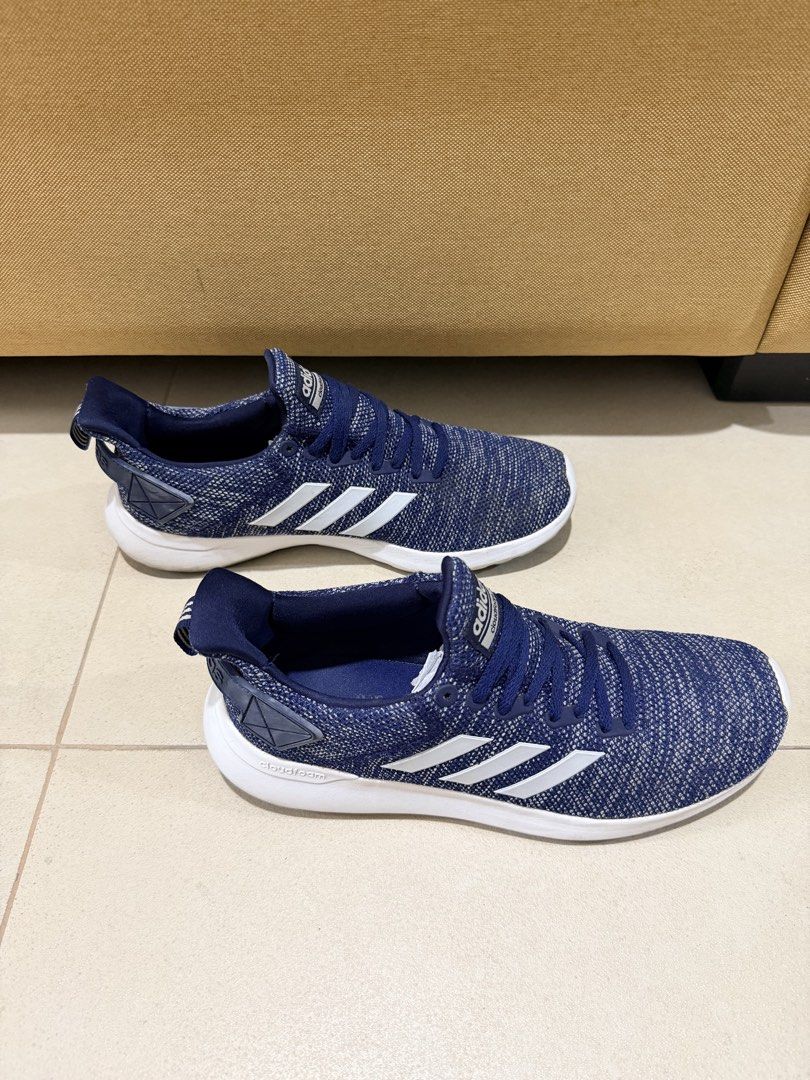 Adidas Lite Racer Cloudfoam Blue Sneakers US 9 (Category: Sneakers) located in Quezon City. Submitted by milkybutter21 (Listing ID 1467640821, Image 2). Description: - Brand: Adidas Cloudfoam - Color: Blue and white knit mesh - Size: Men's US 9 / UK 8.5 / FR 42.5 - Features: Comfortable slip-on fit, lace-up closure, and heel pull tabs - Condition: Light signs of wear on uppers and rubber soles; original tags and size labels intact.
