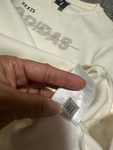 Adidas cream-colored crewneck sweatshirt (Category: Coats, Jackets and Outerwear) located in Manila. Submitted by thriftedbykab (Listing ID 1467718852, Image 3). Description: -Brand: ADIDAS -COMPLETE TAGS -Size: (M) -Width: 22 | Length: 23 -Condition: AS NEW -Color Rate:9.8/10 -Issue: YELLOW STAIN.
