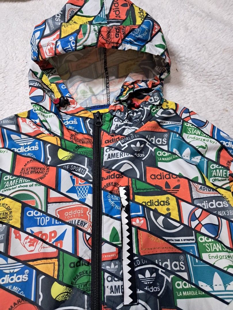 Adidas Men's windbreaker jacket (Category: Coats, Jackets and Outerwear) located in Baguio. Submitted by mishmashfritz (Listing ID 1467674495, Image 2). Description: medium men's windbreaker jacket thrifted, slight faded logo sa back and white part sa may zippered pocket-front.
