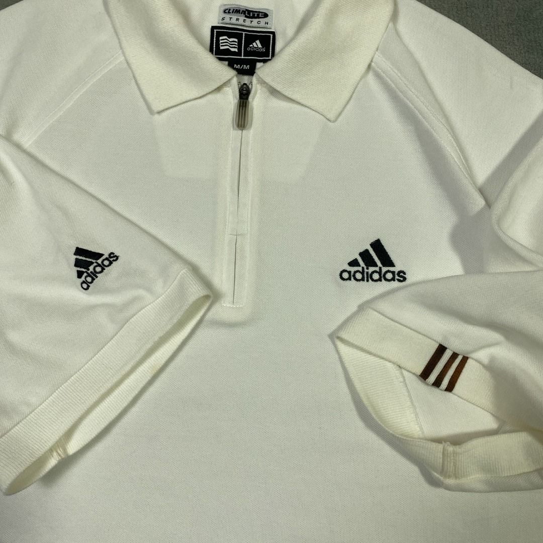 Adidas Q-zip Cropped Polo (Category: Tshirts & Polo Shirts ) located in Imus. Submitted by lsthriftsaig (Listing ID 1467656751, Image 3). Description: Adidas Q-zip Cropped Polo M 26.5 22 Bleach Stain Size tag: Medium Length: 26.5 Width: 22 Issue(s): Bleach stain on sleeve Condition: 9/10 .
