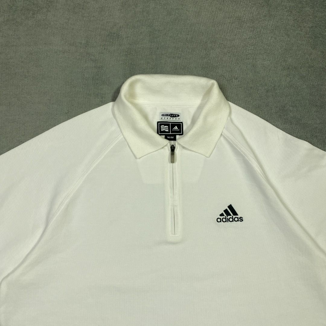 Adidas Q-zip Cropped Polo (Category: Tshirts & Polo Shirts ) located in Imus. Submitted by lsthriftsaig (Listing ID 1467656751, Image 2). Description: Adidas Q-zip Cropped Polo M 26.5 22 Bleach Stain Size tag: Medium Length: 26.5 Width: 22 Issue(s): Bleach stain on sleeve Condition: 9/10 .