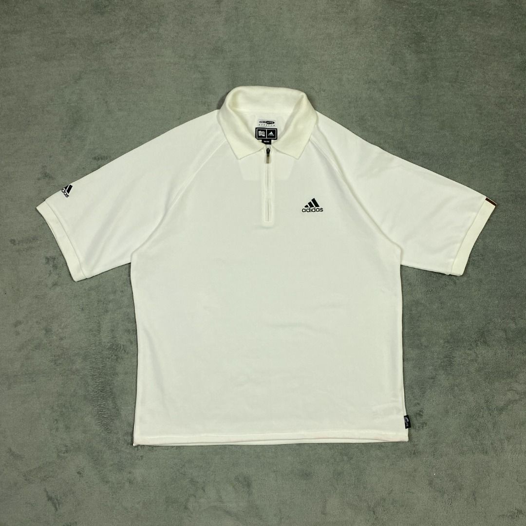 Adidas Q-zip Cropped Polo (Category: Tshirts & Polo Shirts ) located in Imus. Submitted by lsthriftsaig (Listing ID 1467656751, Image 1). Description: Adidas Q-zip Cropped Polo M 26.5 22 Bleach Stain Size tag: Medium Length: 26.5 Width: 22 Issue(s): Bleach stain on sleeve Condition: 9/10 .