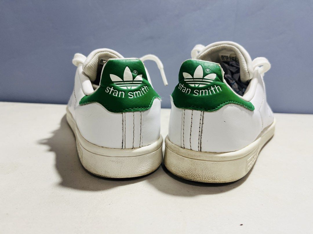 Adidas Stan Smith White Green Sneakers (Category: Sneakers) located in Manila. Submitted by zar0408 (Listing ID 1467744867, Image 3). Description: - Brand: Adidas - Model: Stan Smith - Colorway: White and Green - Upper: Clean white leather with iconic perforated three stripes - Details: Green heel patch with white trefoil logo, Stan Smith portrait on the tongue - Sole: Off-white midsoles with standard lace-up closure - Condition: lightly used(rea