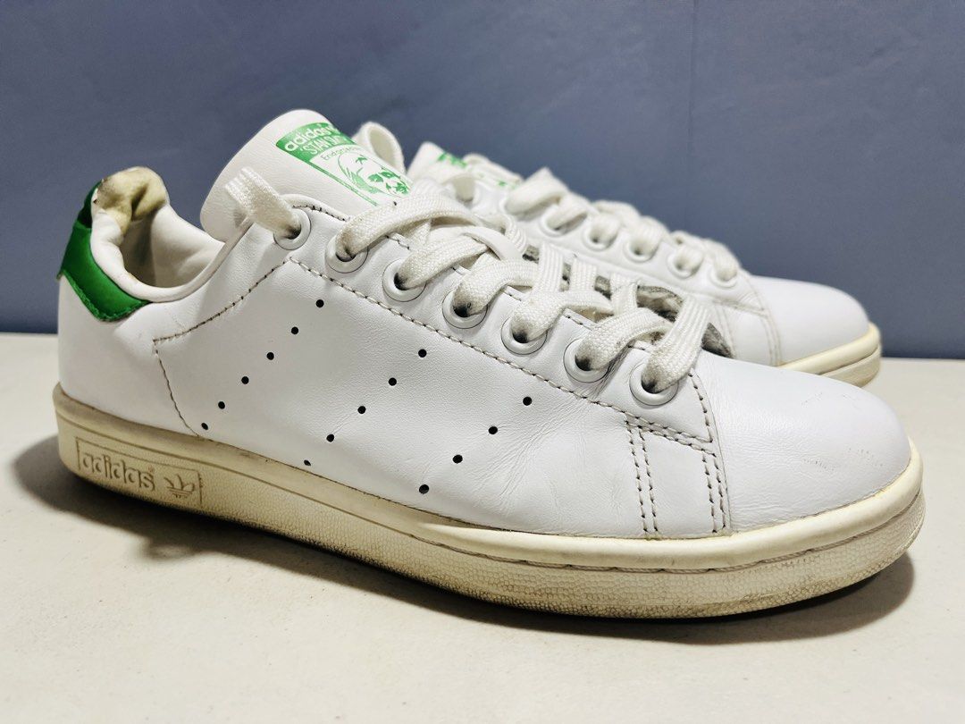 Adidas Stan Smith White Green Sneakers (Category: Sneakers) located in Manila. Submitted by zar0408 (Listing ID 1467744867, Image 2). Description: - Brand: Adidas - Model: Stan Smith - Colorway: White and Green - Upper: Clean white leather with iconic perforated three stripes - Details: Green heel patch with white trefoil logo, Stan Smith portrait on the tongue - Sole: Off-white midsoles with standard lace-up closure - Condition: lightly used(rea