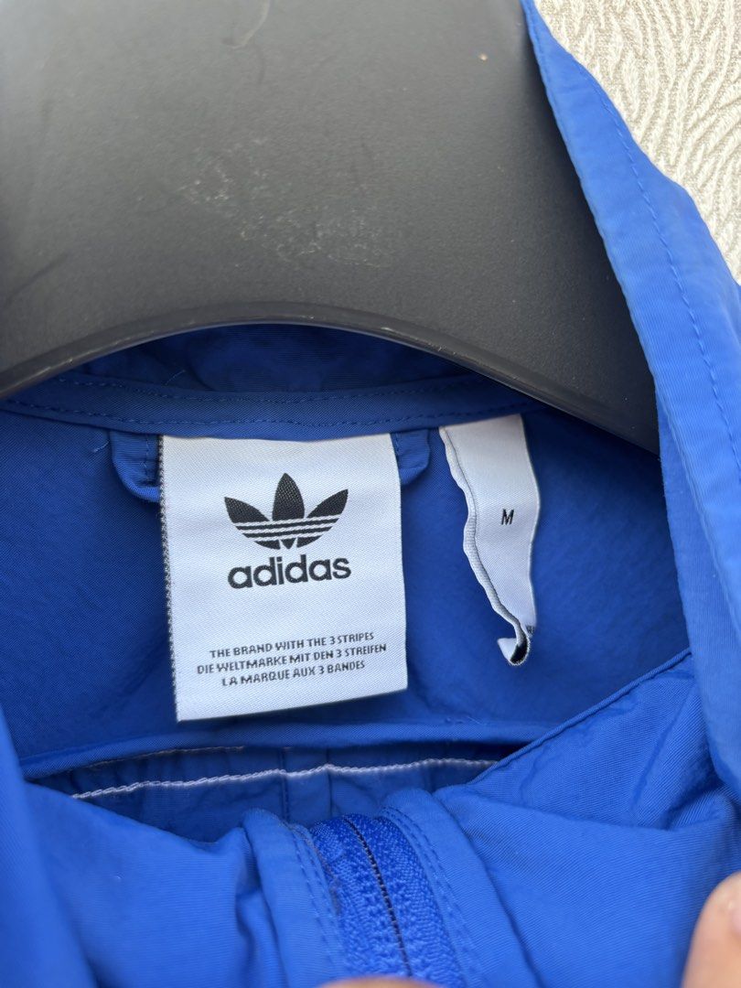 Adidas Track Jacket (Category: Coats, Jackets and Outerwear) located in Baybay. Submitted by thrift.ed2023 (Listing ID 1467674067, Image 3). Description: Adidas Track Jacket Medium to Large 24x23 Boxy Issue -Minimal Fade on Back Collar Need Wash Good as New.