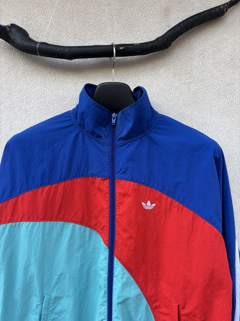 Adidas Track Jacket (Category: Coats, Jackets and Outerwear) located in Baybay. Submitted by thrift.ed2023 (Listing ID 1467674067, Image 2). Description: Adidas Track Jacket Medium to Large 24x23 Boxy Issue -Minimal Fade on Back Collar Need Wash Good as New.