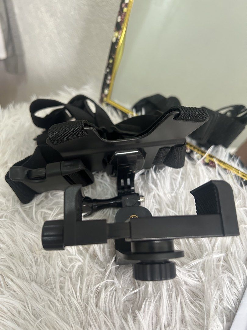 Adjustable Phone Chest Mount Harness Strap (Category: Camera Bags & Carriers) located in Manila. Submitted by la_apparel (Listing ID 1467636004, Image 3). Description: - Hands-free POV recording: Perfect for vlogs, sports, and action shots - Fully adjustable: Elastic straps with quick-release buckle to fit all body sizes - Universal fit: Securely holds most smartphones with the included phone clamp - Complete kit: Comes with a sturdy J-hook mount