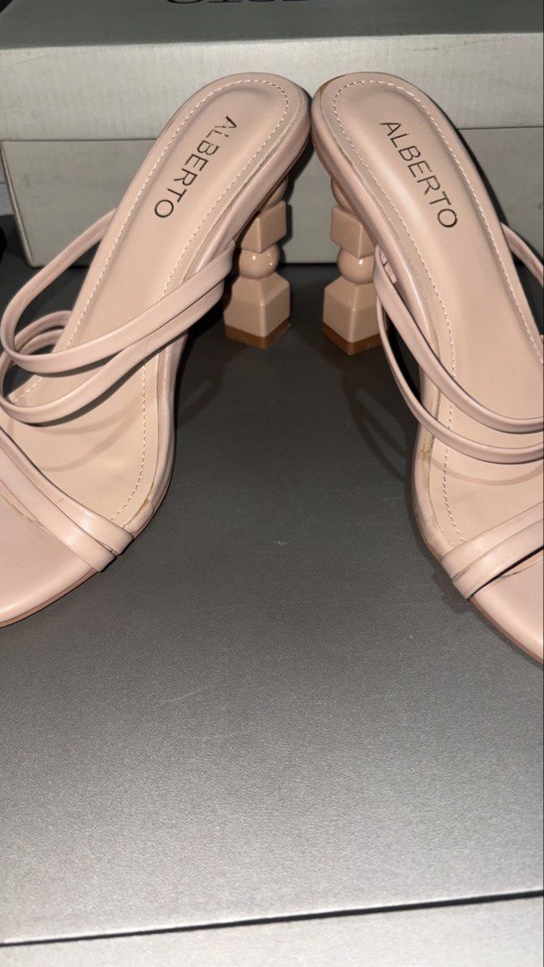 Alberto Nude Heels (Category: Heels) located in Quezon City. Submitted by ayyeeeeell (Listing ID 1467668626, Image 2). Description: Alberto Nude Heels 👠🤍 • Size: EU 37 / US 6 • Color: Nude • Condition: Good as new! ✨ Worn only once at my sister’s wedding and never worn again. Still in great condition! Perfect for formal occasions, weddings, and other special events. 🤍 Bought for ₱1,200 and selling for only ₱700! Mode of Payment: BPI/ MARIBANK/