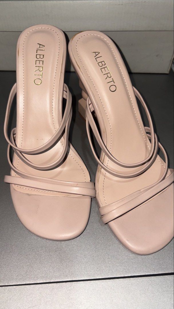 Alberto Nude Heels (Category: Heels) located in Quezon City. Submitted by ayyeeeeell (Listing ID 1467668626, Image 1). Description: Alberto Nude Heels 👠🤍 • Size: EU 37 / US 6 • Color: Nude • Condition: Good as new! ✨ Worn only once at my sister’s wedding and never worn again. Still in great condition! Perfect for formal occasions, weddings, and other special events. 🤍 Bought for ₱1,200 and selling for only ₱700! Mode of Payment: BPI/ MARIBANK/