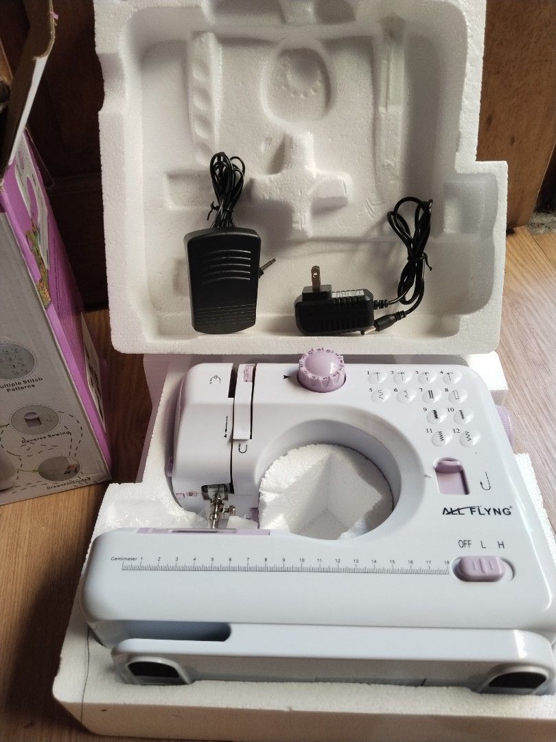 ALL FLYNG Mini Sewing Machine — YASM-505A | Used ONCE Only! (Category: Other Home Appliances) located in Caloocan City. Submitted by purplemomma (Listing ID 1467713123, Image 2). Description: ✨ Like New Condition — Literally used just once! ✨ 📌 Specs: - Model: YASM-505A ​ - 12 built-in stitch patterns ​ - Long-lasting LED light ​ - Reverse sewing function ​ - Bobbin rewinder & drawer included ​ - Interchangeable foot ​ - Dual speed control (Low 