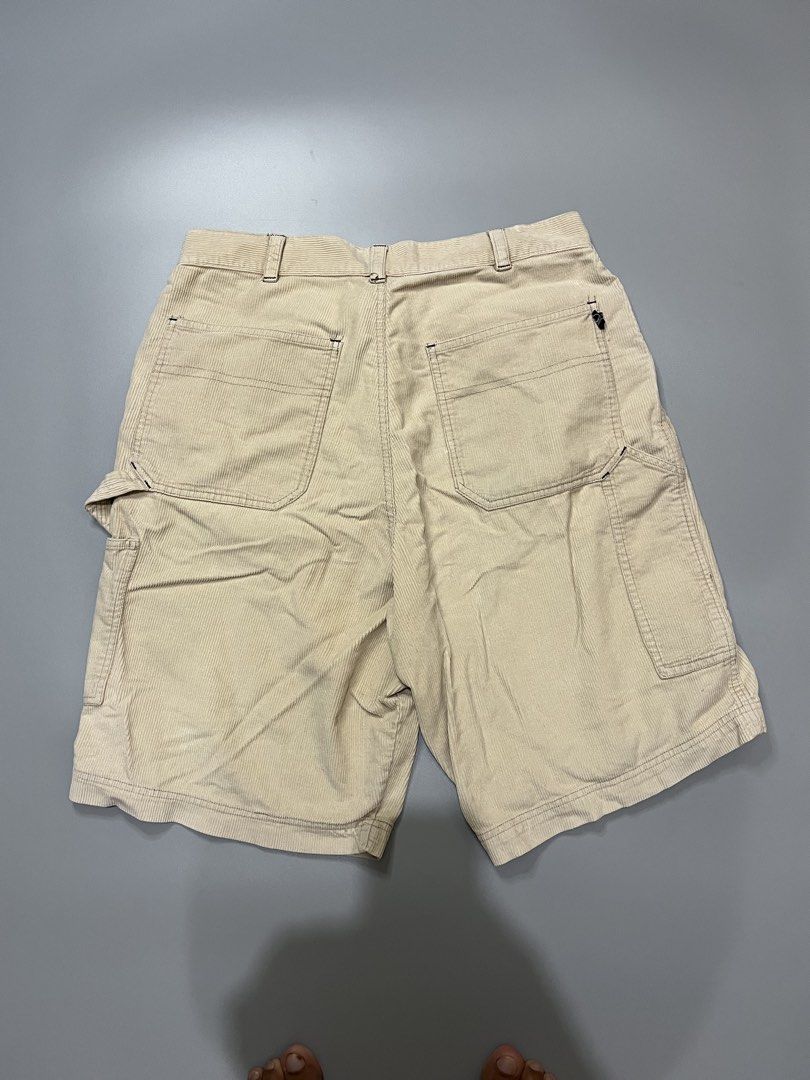 Aloha Corduroy Cargo Shorts Beige (Category: Shorts) located in Manila. Submitted by jorgemabelin2001 (Listing ID 1467760449, Image 2). Description: - Brand: Aloha - Item: Corduroy Cargo Shorts - Color: Cream Beige - Style: Utility, skate, streetwear - Features: Multiple pockets, hammer loop, front button closure - Details: Embroidered brand logo near hem and woven tag on back pocket - Fabric: Classic textured ribbed corduroy.