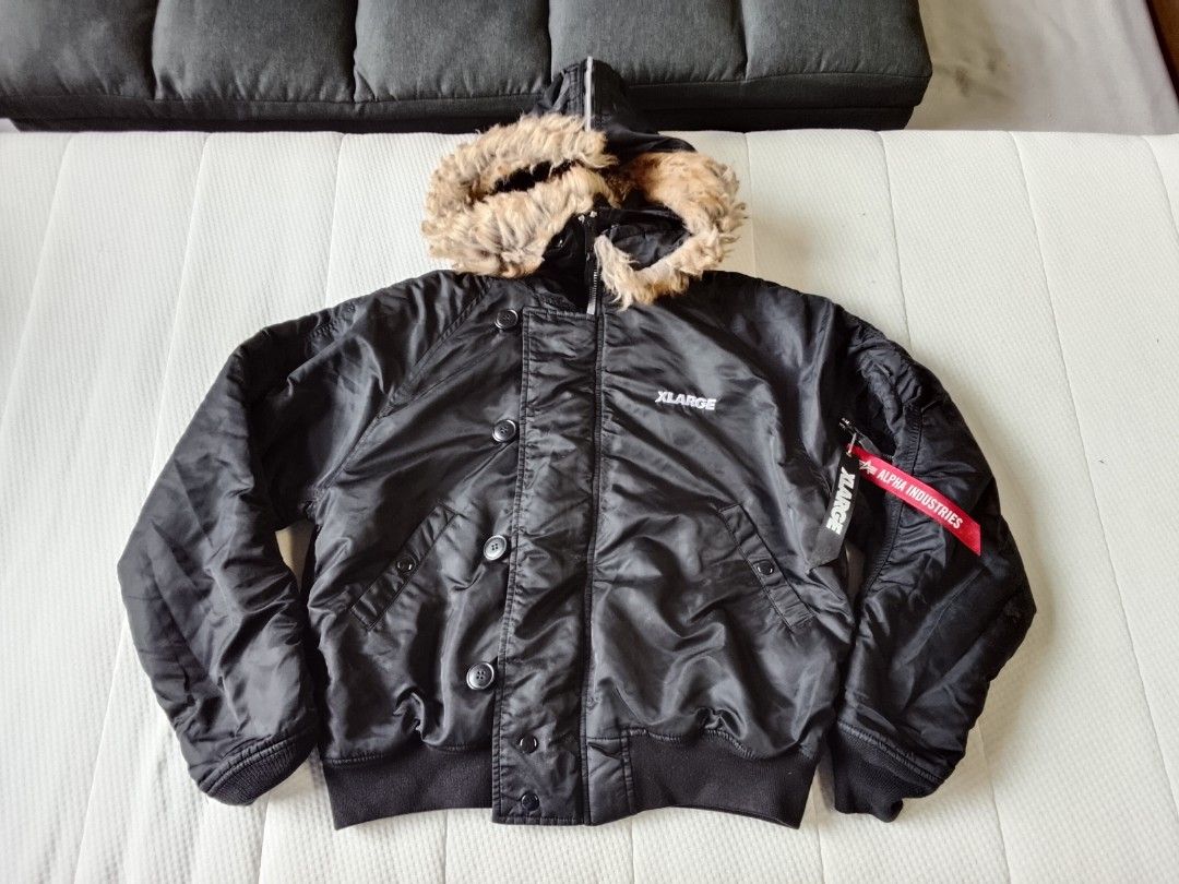 Alpha X Xlarge N2B core spec winter jacket / Alpha Industries (Category: Coats, Jackets and Outerwear) located in Manila. Submitted by newage.vintage (Listing ID 1467649736, Image 1). Description: - Brand collaboration: Alpha Industries X Xlarge - Colorway: All black ( black outer shell, black lining, black ribbed trim, and tonal black embroidery - Release era: Fall / winter 2024 collection - Outer materials: Durable, water resistant 100% flight 