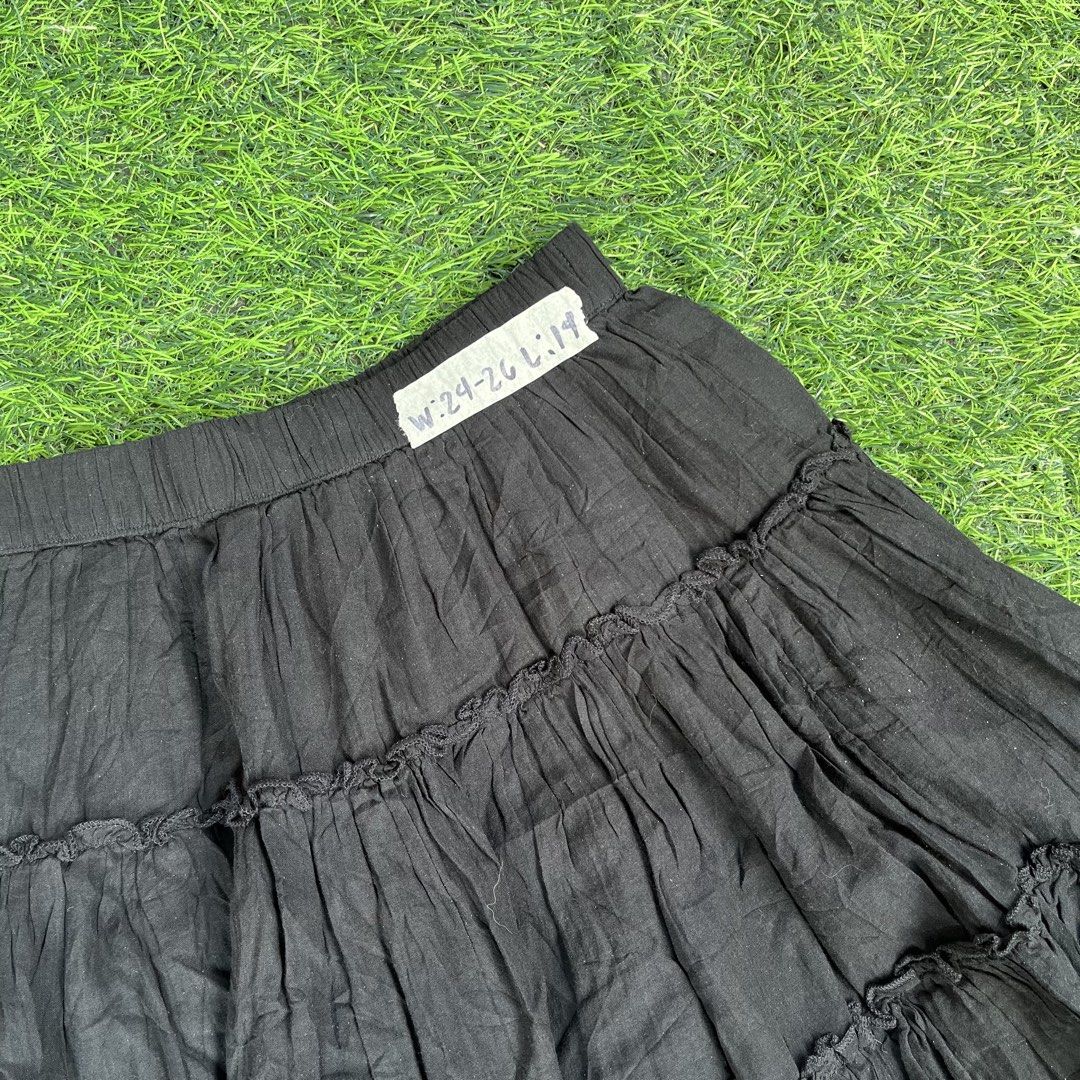 American Eagle Black Tiered Mini Skirt XS (Category: Skirts) located in Cuyapo. Submitted by Ashtyn.Pre.Loved (Listing ID 1467730745, Image 2). Description: Black tiered mini skirt from American Eagle. Features a stretchy elastic waistband with gathered ruffles down the length. Lightweight cotton material with a textured crinkle finish. Size XS on the tag. Measured waist approximately 24 to 26 inches, length around 14 inches. Made in India. Easy 