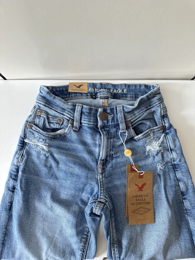 American Eagle Outfitters Distressed Stretch Jeans size 24 (Category: Jeans) located in Manila. Submitted by slayannajayne (Listing ID 1467741652, Image 1). Description: - Brand: American Eagle Outfitters - Condition: Brand new with original paper tags attached - Wash: Light blue with trendy distressed details at knees and pockets - Fit: Slim fit through the legs - Closure: Classic hardware and button closure - Style: Casual, versatile, and comfo