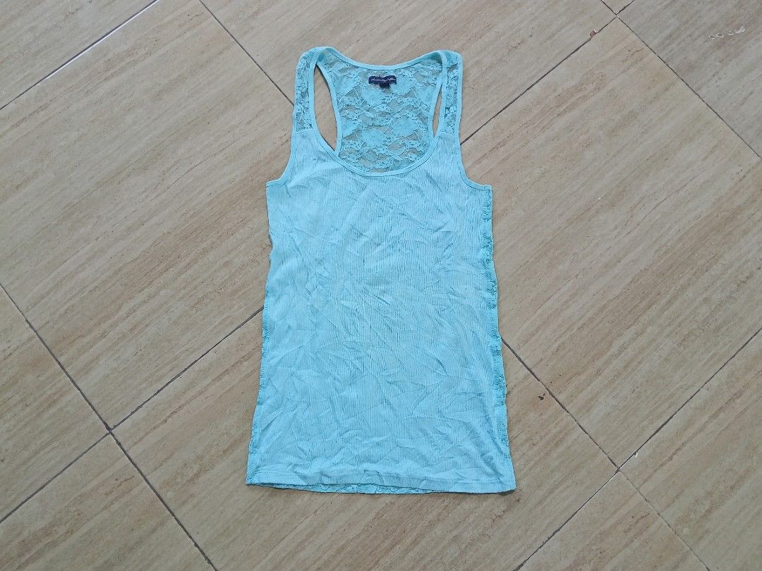 American eagle y2k Tank top (Category: Others Tops) located in Glan. Submitted by cpaharodde48008 (Listing ID 1467750019, Image 1). Description: y2k American Eagle Tank top like new condition size Large.