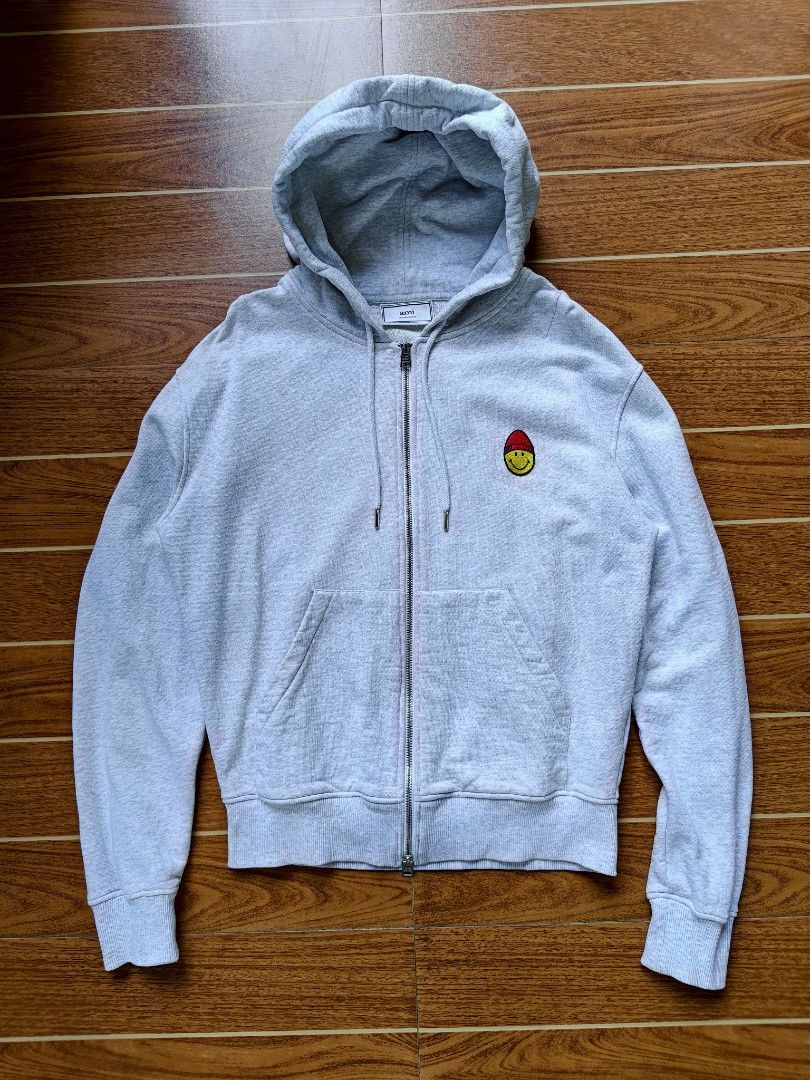 Ami x Smiley Double Zip Hoodie (Category: Hoodies) located in Davao. Submitted by raymnd89 (Listing ID 1467746935, Image 1). Description: Ami x Smiley Double Zip Hoodie S: Medium L: 25 W: 21 Color rate: 9.5 or better Excellent condition Already washed Issue: none.