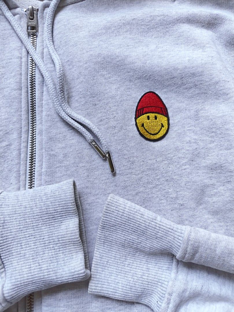 Ami x Smiley Double Zip Hoodie (Category: Hoodies) located in Davao. Submitted by raymnd89 (Listing ID 1467746935, Image 3). Description: Ami x Smiley Double Zip Hoodie S: Medium L: 25 W: 21 Color rate: 9.5 or better Excellent condition Already washed Issue: none.