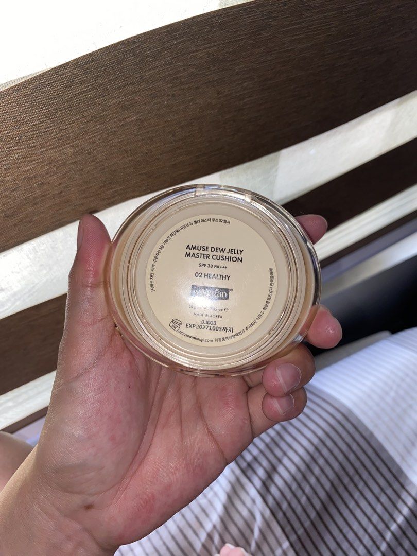 AMUSE Dew Jelly Master Cushion 02 Healthy (Category: Makeup) located in Manila. Submitted by stormiegray (Listing ID 1467794586, Image 2). Description: AMUSE Dew Jelly Master Cushion in shade 02 Healthy. SPF 38 PA+++ rating. Net weight 15g. Made in Korea. Vegan formula. Expiry date printed on the bottom is 20271003. Unopened packaging, clean compact with embossed branding on top. brought from korea.