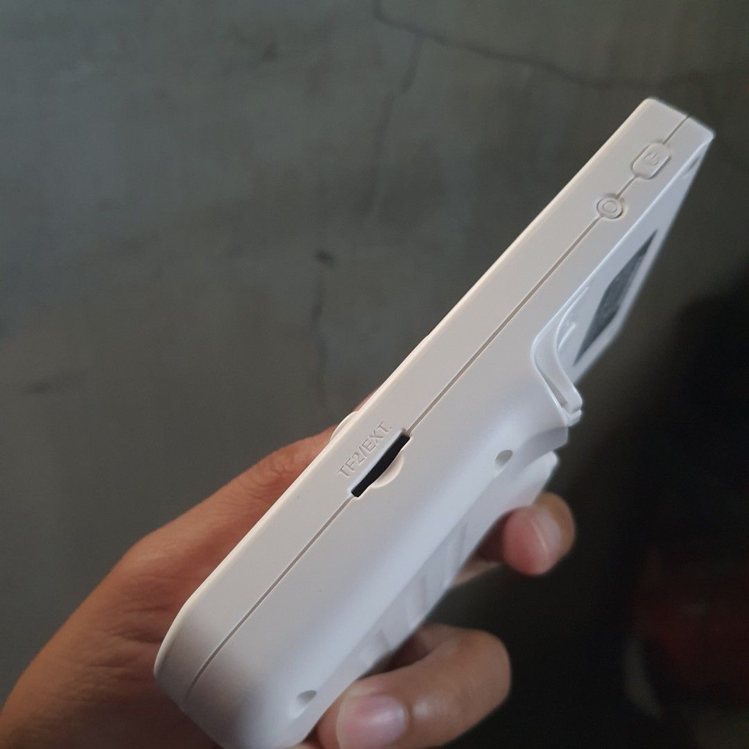 Anbernic RG350X Pro Handheld Game Console (Category: Nintendo) located in Tarlac. Submitted by jajubells (Listing ID 1467614652, Image 3). Description: - Model: Anbernic RG350X Pro Retro Handheld - Color: Clean white plastic casing - Controls: Dual analog sticks, D-pad, face buttons, and rear shoulder triggers - Ports & Slots: Dual TF card slots, USB-C charging port, HDMI output, and headphone jack - Condition: Fully functional, great portable co