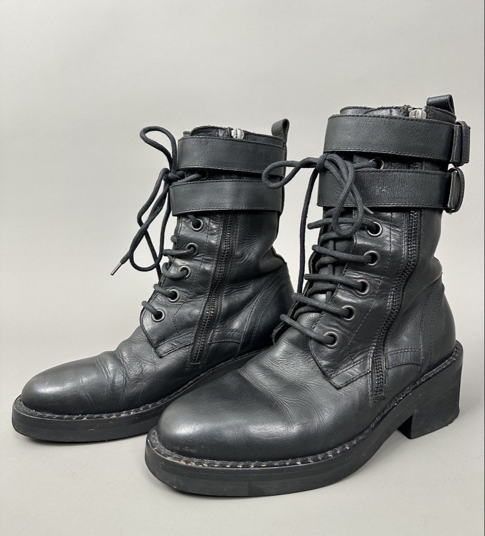Ann Demeulemeester - Danny Combat Leather Laced-Up Boots. (Category: Boots) located in Manila. Submitted by scissor.2fifthy (Listing ID 1467642051, Image 2). Description: Ann Demeulemeester - Danny Combat Leather Laced-Up Boots. Featured double strap and double side zipper in closure. Tagged size: 35 (see measurement) Made in Italy Material: Leather 85/100 condition rate Used with care Flaw: Minor sign of usage and some scratch Very presentable C