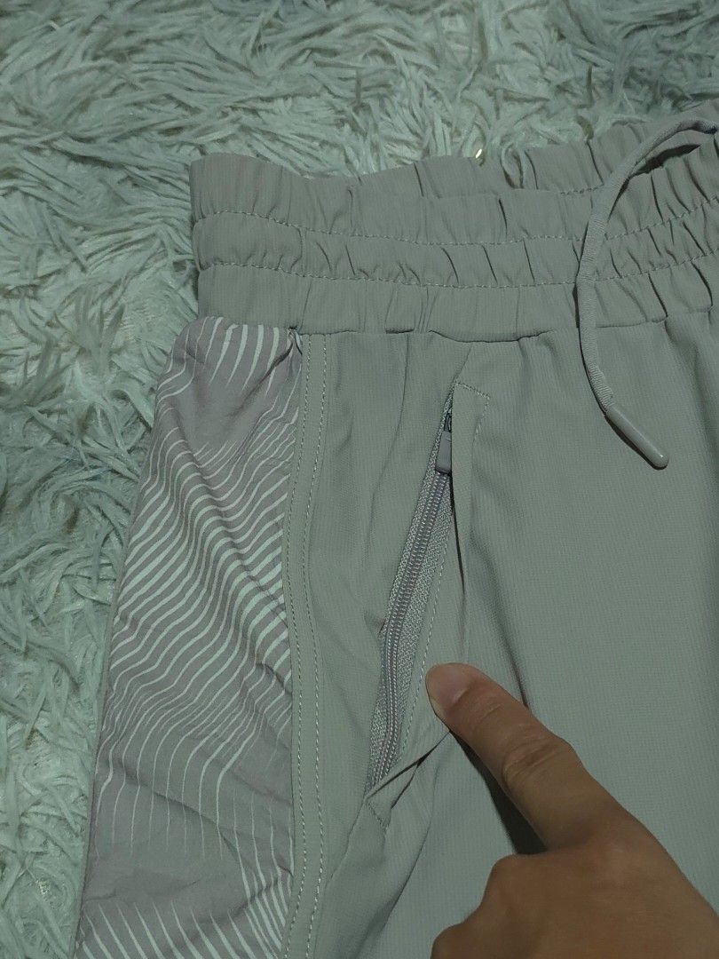 Anta Tech Training Sports Shorts (Category: Shorts) located in Abulug. Submitted by humanwhosellthings (Listing ID 1467734863, Image 3). Description: - Brand:ANTA Womens Drifit Short ✅Excellent Condition ✅Issue: none ▫️Waist Size: 26-32 ▫️Length: 11 - Style: Tech training shorts - Color: Grey - Size: S (fits 160/68A) - Material: Lightweight 78% nylon, 22% spandex blend - Features: Elastic waistband with adjustable drawstring - Storage: Secure zip
