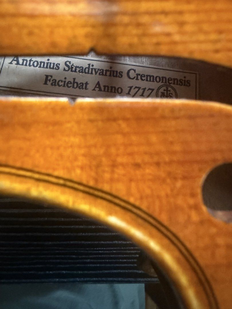 Antonius Stradivarius Cremonensis 1717 Copy Violin (Category: Musical Instruments) located in Manila. Submitted by happytiger-4660 (Listing ID 1467732038, Image 1). Description: - Size: Full size acoustic violin(Strad Copy) - Label: Antonius Stradivarius Cremonensis Faciebat Anno 1717 - Woods: Nice flamed maple back and tight grain spruce top - Finish: Warm amber varnish - Inclusions: Bridge, tailpiece with fine tuner, chin rest, and strings inst