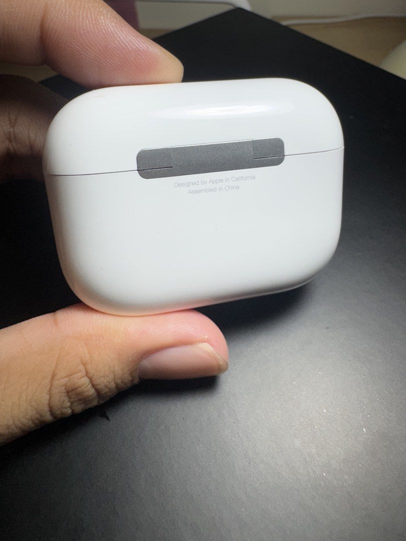 Apple AirPods Pro Charging Case (Category: Earphones) located in Calamba. Submitted by santipreloveditems (Listing ID 1467613967, Image 2). Description: - Apple AirPods Pro charging case (White) - Glossy finish with durable metal hinge and front LED status light - Clean interior with dual earbud slots and working charging contacts - Free black silicone protective cover included .