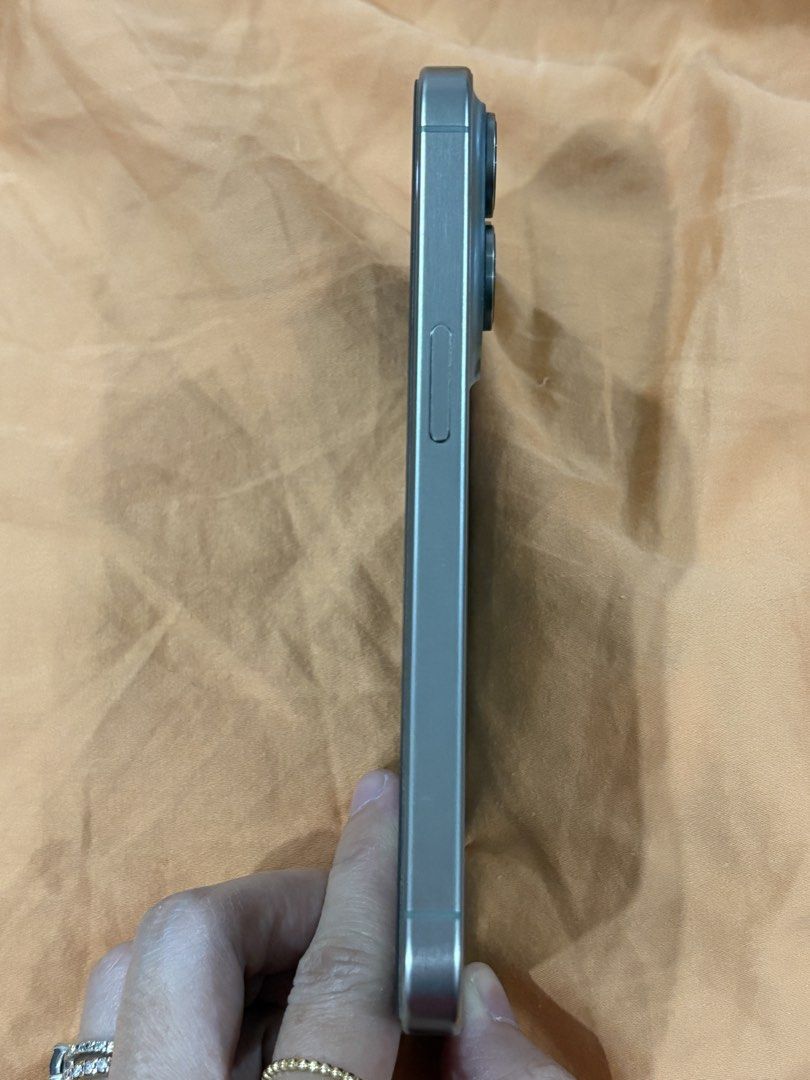 Apple iPhone 15 Pro 128 GB Natural Titanium (Category: iPhone 15 Series) located in Manila. Submitted by summercookie (Listing ID 1467767595, Image 3). Description: Apple iPhone 15 Pro 128 GB Natural Titanium 85% battery health IOS 27.0.1 With case, extra case, extra screen protector, cable, and box.