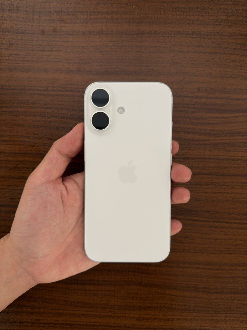 Apple iPhone 16 White 128GB (Category: iPhone 16 Series) located in Quezon City. Submitted by geoffalturino (Listing ID 1467742853, Image 3). Description: - Model: Apple iPhone 16 - Color: White - Storage: 128GB - Battery Health: 100% (Only 8 cycle counts) - Condition: Unused / Pristine (Stored back in original packaging) - Exterior: Flawless screen and back glass - Inclusions: Original box and USB-C charge cable included - RFS: Need funds for a 