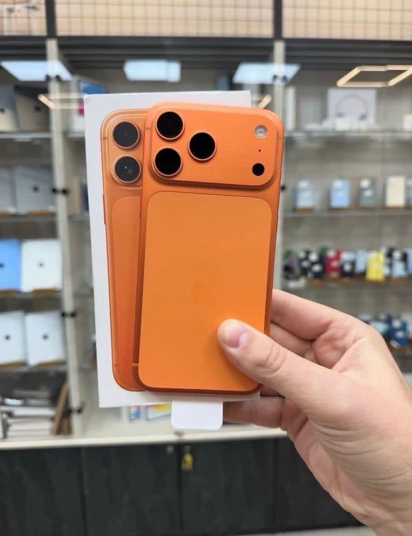 Apple iPhone (Category: iPhone X Series) located in Caloocan City. Submitted by wilddeer_094ef3 (Listing ID 1467676941, Image 1). Description: - Available Colors: Orange and dark blue - Camera: Triple camera setup with a raised module - Design: Clean screens with thin bezels and Apple logo in the middle - Inclusions: Original box and charging cable - Stock: Multiple units available.