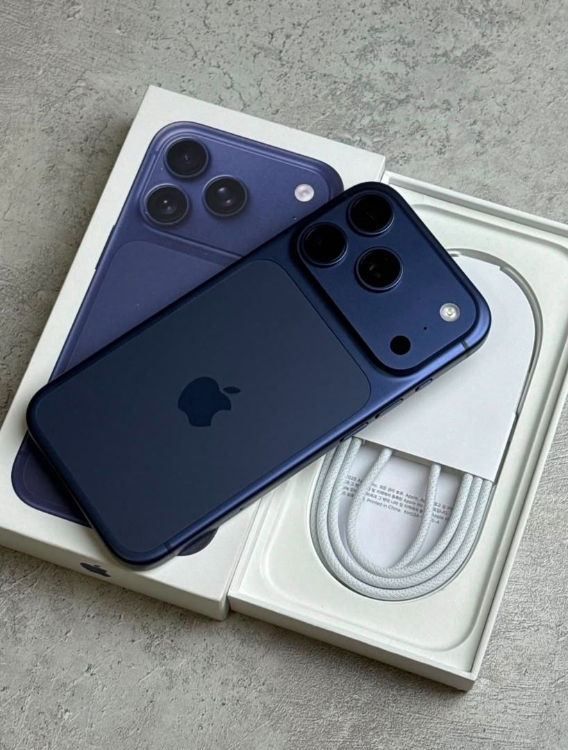 Apple iPhone (Category: iPhone X Series) located in Caloocan City. Submitted by wilddeer_094ef3 (Listing ID 1467676941, Image 2). Description: - Available Colors: Orange and dark blue - Camera: Triple camera setup with a raised module - Design: Clean screens with thin bezels and Apple logo in the middle - Inclusions: Original box and charging cable - Stock: Multiple units available.
