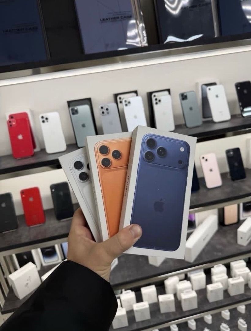 Apple iPhone (Category: iPhone X Series) located in Caloocan City. Submitted by wilddeer_094ef3 (Listing ID 1467676941, Image 3). Description: - Available Colors: Orange and dark blue - Camera: Triple camera setup with a raised module - Design: Clean screens with thin bezels and Apple logo in the middle - Inclusions: Original box and charging cable - Stock: Multiple units available.
