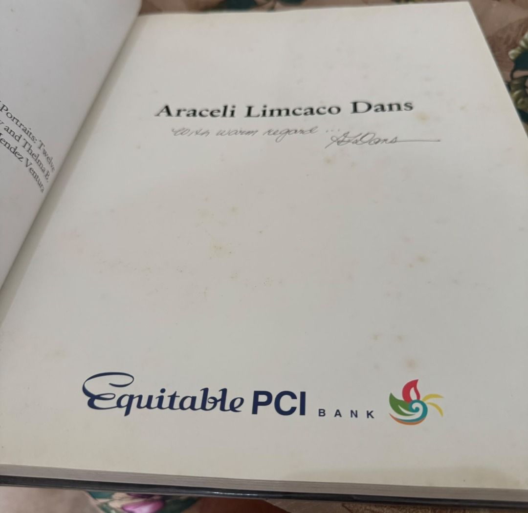 Araceli Limcaco Dans Signed Art Book (Category: Storybooks) located in Paranaque City. Submitted by jiggybautista (Listing ID 1467640902, Image 3). Description: - Hardcover art book featuring works by renowned Filipino artist Araceli Limcaco Dans - Includes stunning plates of still lifes, baskets, hats, chairs, and florals - Personally signed on the inside page with a warm note from the artist - Published in partnership with Equitable PCI Bank - 