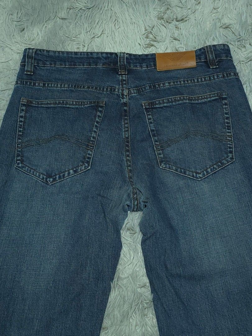 Armani Jeans Blue Denim Pants (Category: Jeans) located in Abulug. Submitted by humanwhosellthings (Listing ID 1467643025, Image 3). Description: - Brand: ARMANI EXCHANGE Denim Pants ✅Excellent Condition ✅Issue: none ▫️Waist Size: 34 ▫️Length: 38 - Color/Wash: Classic blue mid-wash - Fit: Straight fit, comfortable everyday wear - Details: Standard 5-pocket styling, contrast stitching, belt loops - Branding: Brown leather logo patch on back waistb