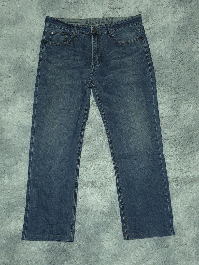 Armani Jeans Blue Denim Pants (Category: Jeans) located in Abulug. Submitted by humanwhosellthings (Listing ID 1467643025, Image 2). Description: - Brand: ARMANI EXCHANGE Denim Pants ✅Excellent Condition ✅Issue: none ▫️Waist Size: 34 ▫️Length: 38 - Color/Wash: Classic blue mid-wash - Fit: Straight fit, comfortable everyday wear - Details: Standard 5-pocket styling, contrast stitching, belt loops - Branding: Brown leather logo patch on back waistb