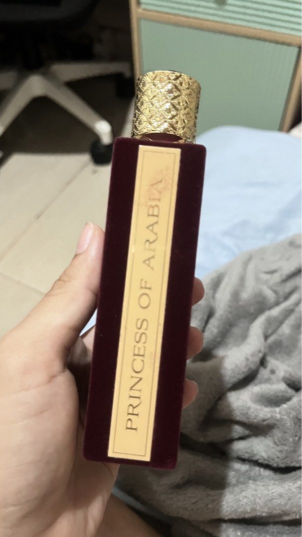 Asdaaf Ameerat Al Arab Eau De Parfum 100ml (Category: Fragrance & Deodorants) located in Antipolo. Submitted by france.29 (Listing ID 1467623260, Image 2). Description: - Brand/Scents: Asdaaf Ameerat Al Arab by Lattafa - Concentration/Size: Eau de Parfum (EDP), 100ml / 3.4 fl. oz - Packaging: Comes in a matching luxury red velvet box with gold trim - Bottle Design: Velvet maroon bottle with elegant gold cap and accents - Performance: Strong Arabi