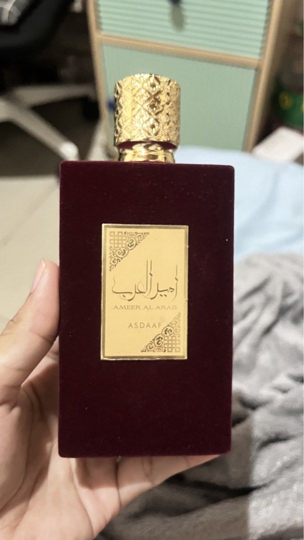 Asdaaf Ameerat Al Arab Eau De Parfum 100ml (Category: Fragrance & Deodorants) located in Antipolo. Submitted by france.29 (Listing ID 1467623260, Image 1). Description: - Brand/Scents: Asdaaf Ameerat Al Arab by Lattafa - Concentration/Size: Eau de Parfum (EDP), 100ml / 3.4 fl. oz - Packaging: Comes in a matching luxury red velvet box with gold trim - Bottle Design: Velvet maroon bottle with elegant gold cap and accents - Performance: Strong Arabi