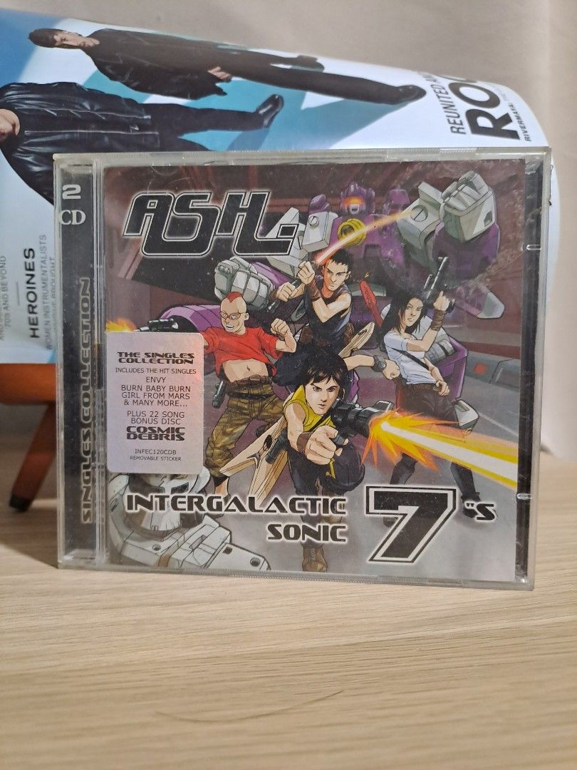 ASH Intergalactic Sonic 7s Singles Collection 2 CD (Category: CDs & DVDs) located in Las Pinas. Submitted by cobieshop (Listing ID 1467763221, Image 1). Description: - Artist & Album: Ash - Intergalactic Sonic 7s (Singles Collection Double CD) - Key Tracks: Includes hits like Envy, Burn Baby Burn, and Girl From Mars - Bonus: Comes with an extra 22-song bonus disc - Condition: Original jewel case with hype sticker included, discs play great - Perf