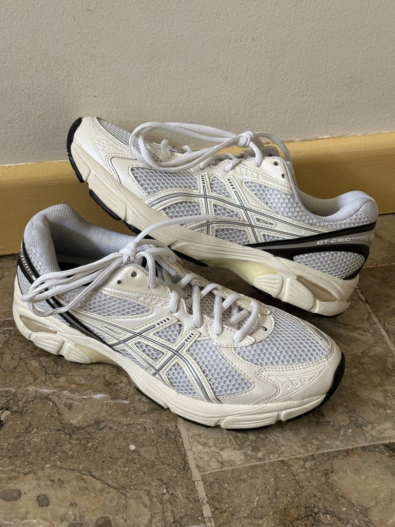 ASICS GT-2160 White / Black (Category: Sneakers) located in Marikina City. Submitted by z-mart (Listing ID 1467618626, Image 1). Description: - 100% Authentic - Size: 8.5 US Men’s - Usage: Extremely low mileage. Worn very lightly and carefully. - Condition: 9.5/10 - Frame & Upper: White mesh is bright and crisp with no stains, scuffs, or tears. Insoles show zero graphic fading. - Outsoles: Minimal to no wear. Traction patterns and GEL pods are co