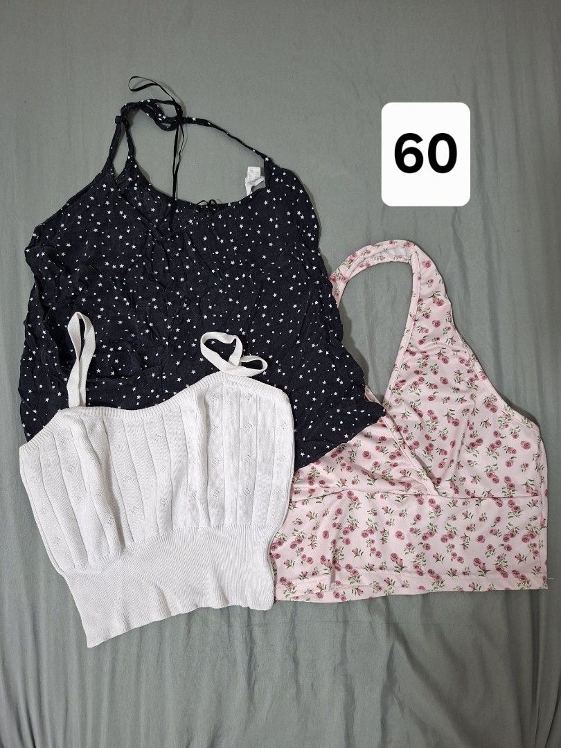 Assorted Crop Tops Bundle - Various Styles and Colors (Category: Shirts) located in Taguig. Submitted by abuanbea (Listing ID 1467676861, Image 3). Description: - Bundle includes assorted crop tops: tank tops, tube tops, and short sleeve styles - Features various colors and prints like floral, solid white, black, and orange - Assorted necklines including scoop neck, halter, and off-shoulder designs - Made with a mix of comfortable ribbed and smoo